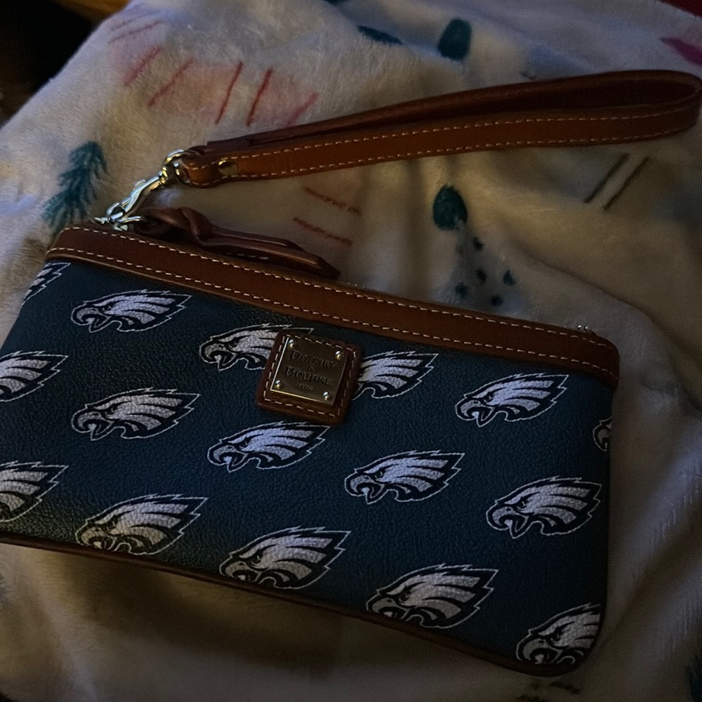 Philadelphia Eagles Dooney wristlet approx 4.5 tall 9”long